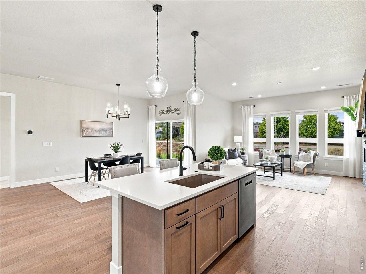 Property Photo 5 The open-concept layout is perfect for both everyday living and entertaining.