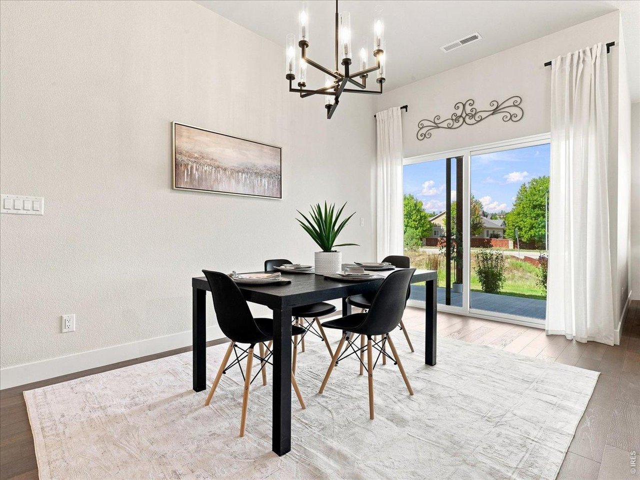 Property Photo 15 Spacious dining area offers seamless indoor and outdoor entertaining.