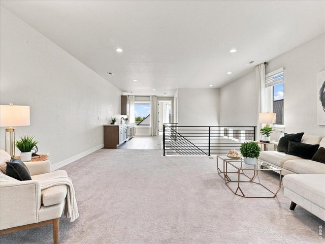 Property Photo 31 Upstairs loft creates the perfect second living room, game room or media space.