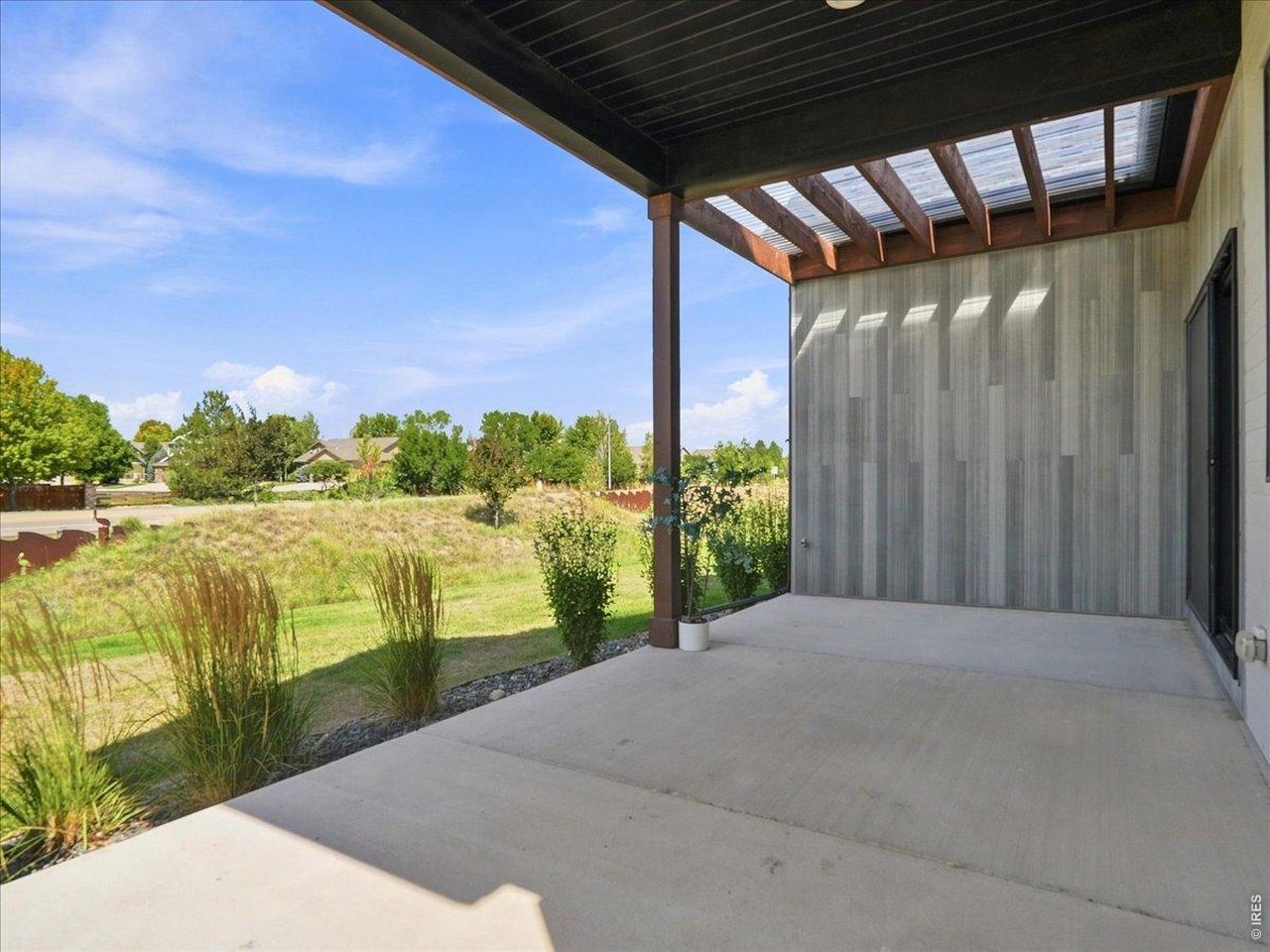 Property Photo 46 Enjoy Colorado evenings under the fully covered pergola patio. Gas line for your BBQ makes outdoor gatherings simple.