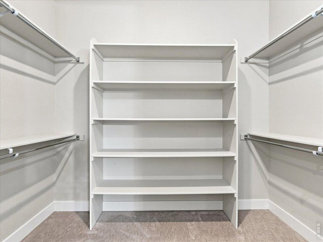 Property Photo 25 Large walk-in closet offers exceptional storage.
