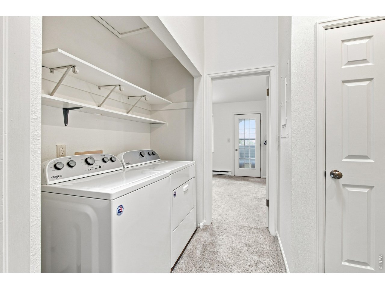 Property Photo 16 Convenient upper-level laundry area with washer and dryer included.