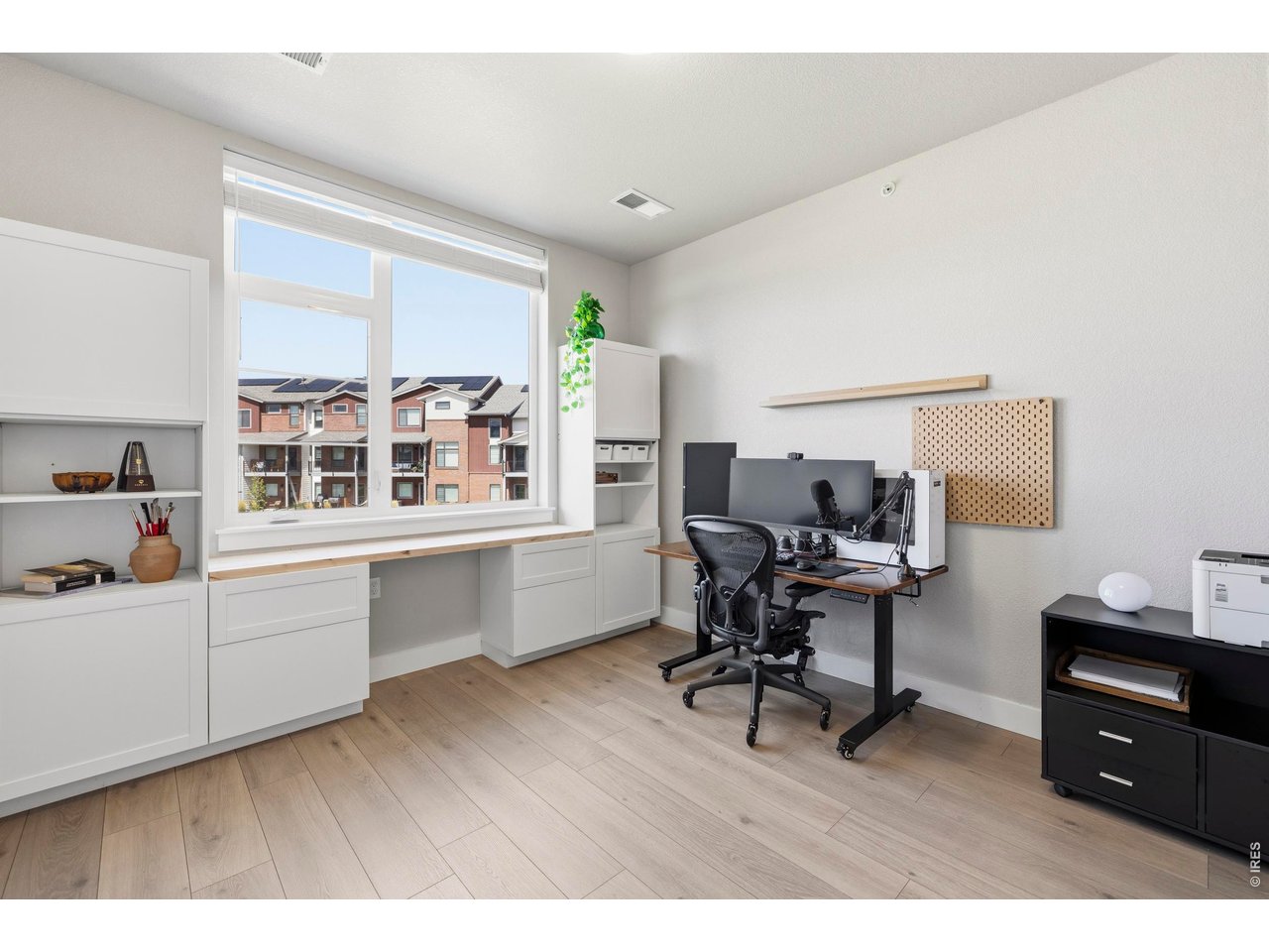 Property Photo 18 office comes complete with laminate plank Haven Toast to match the kitchen dining and living rooms