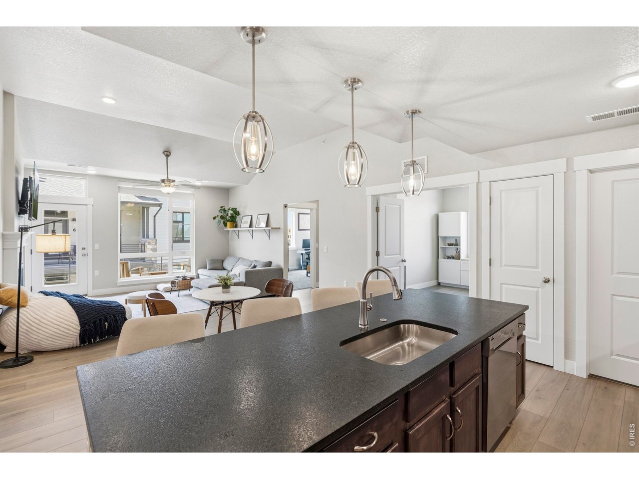 Property Photo 7 The kitchen as you walk in with Black pearled leather granite on the breakfast bar