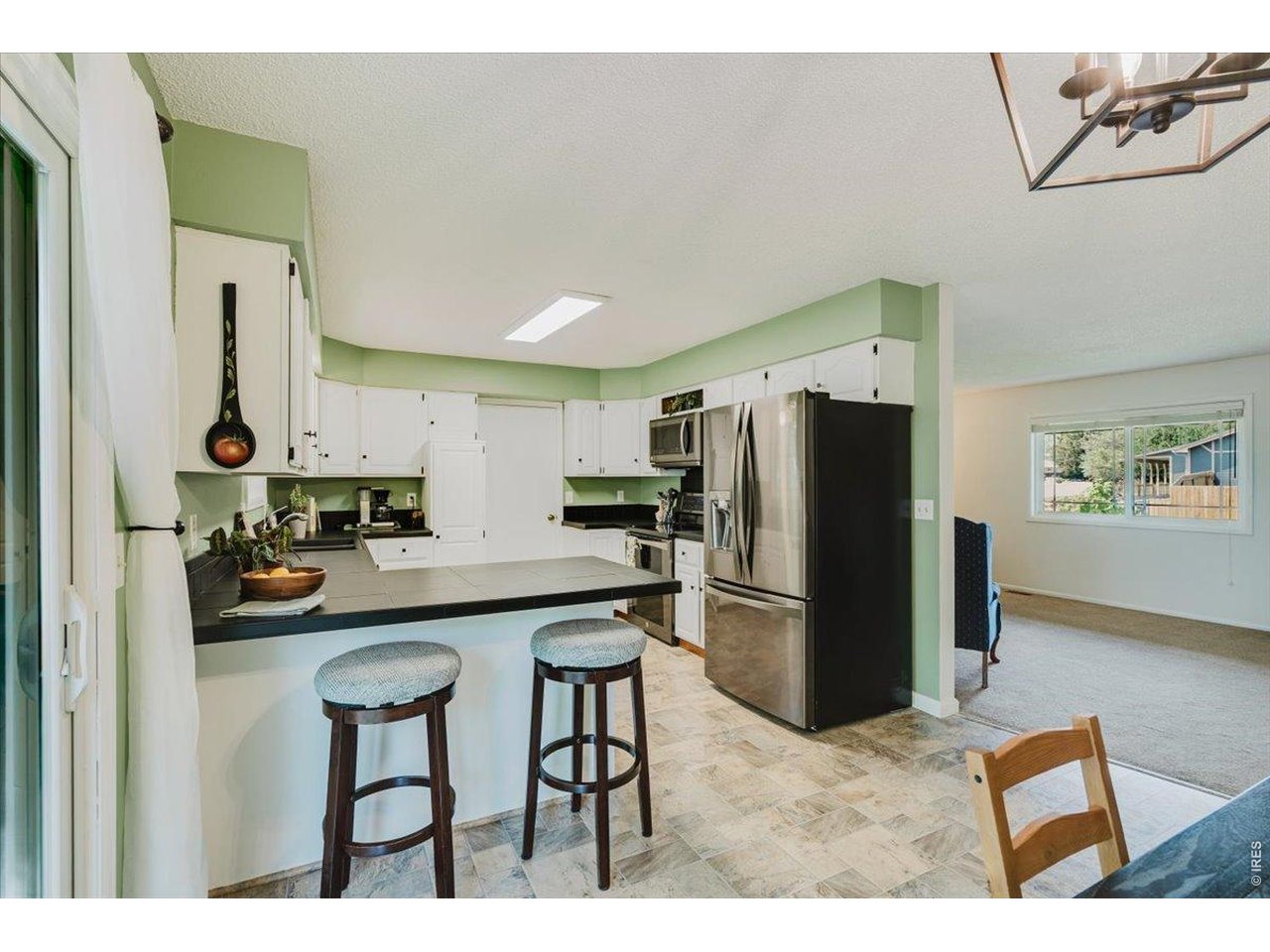 Property Photo 10 Newer refrigerator and stove