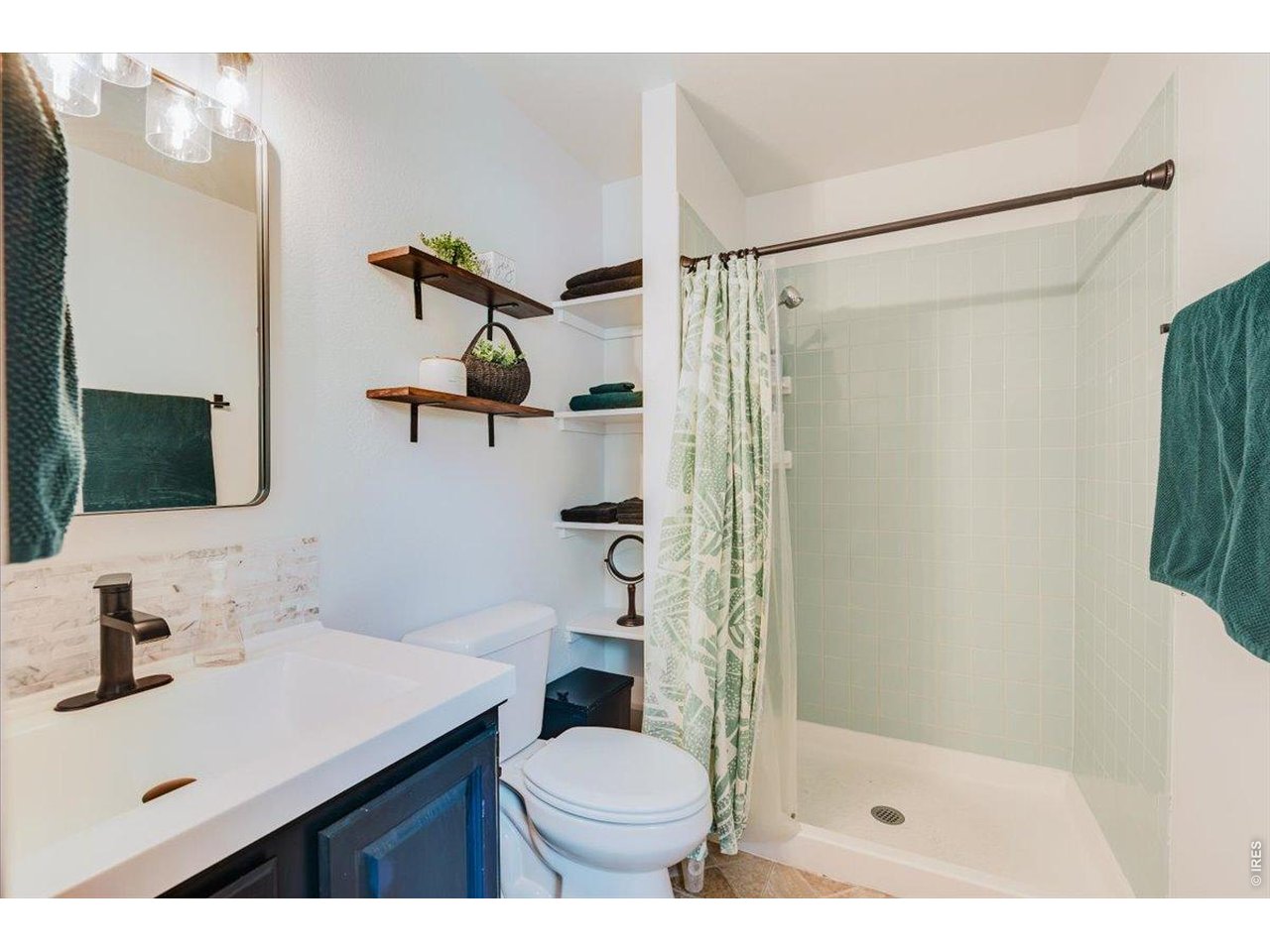 Property Photo 24 The primary bedroom has an updated en suite bathroom