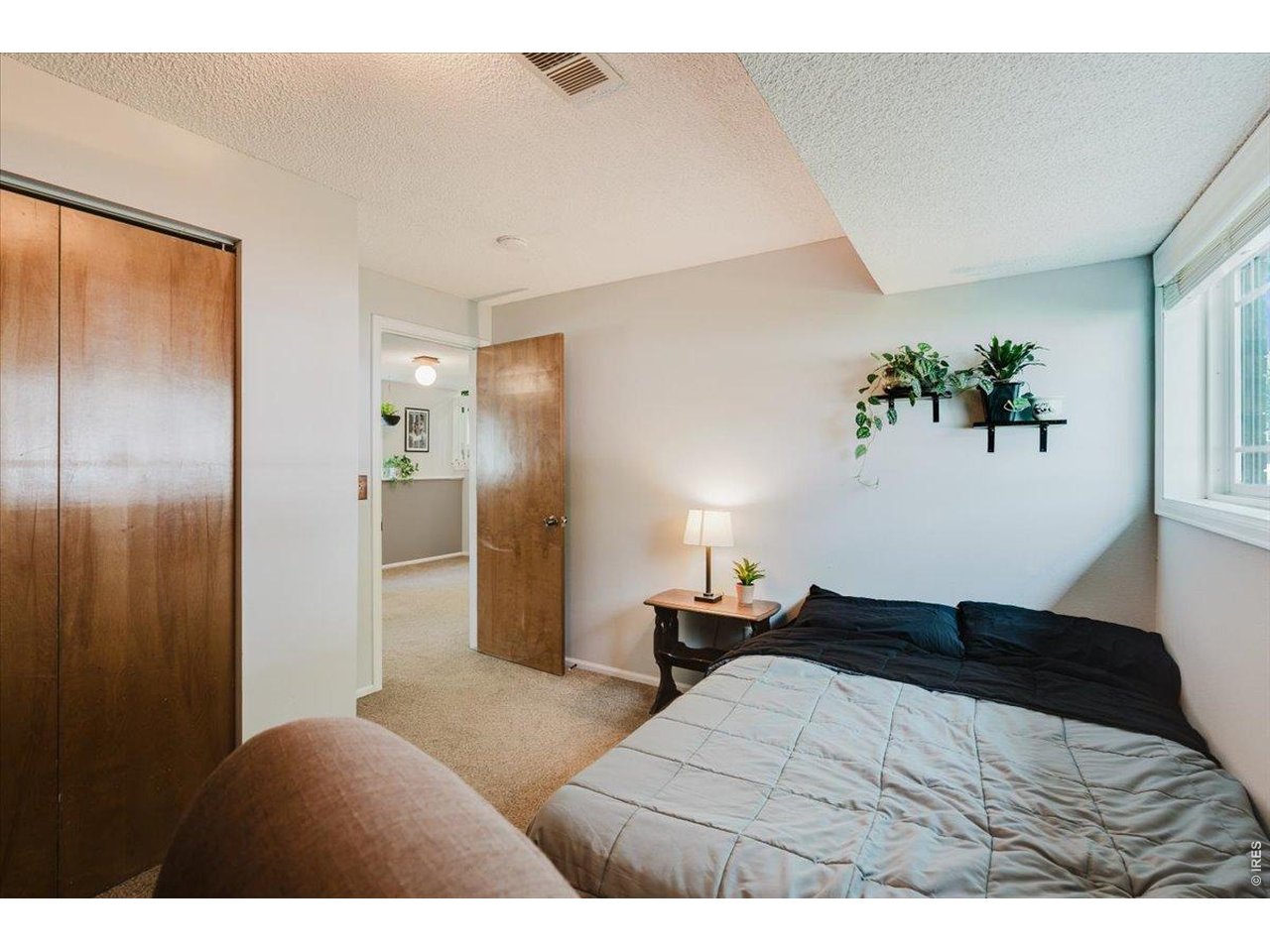 Property Photo 34 4th bedroom is garden level, it gets plenty of light