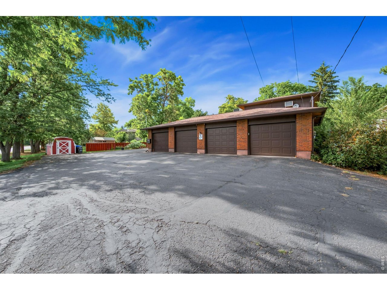 Property Photo 3 Dedicated garage space for each unit plus additional off-street parking.