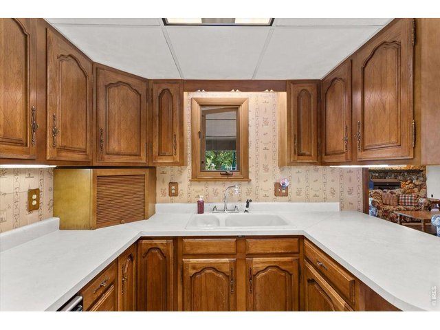Property Photo 12 Lots of cabinet and counter space.