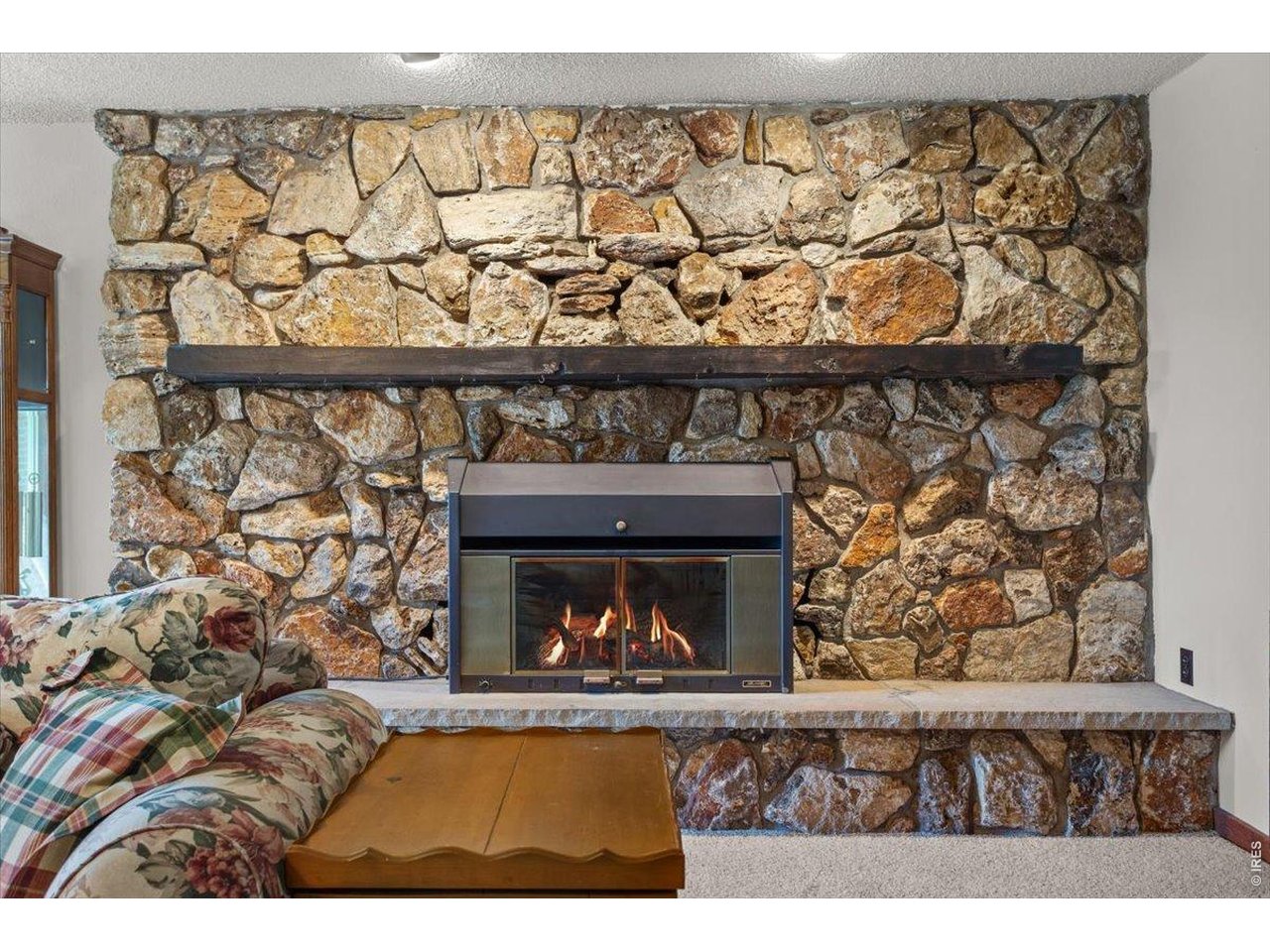 Property Photo 24 Custom stone fire place that anchors the large space.