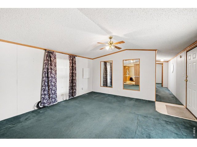 Property Photo 15 Living area with gas fireplace just out of view to the far right