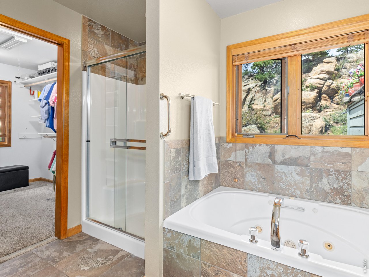 Property Photo 27 Oversized shower and soothing bathtub
