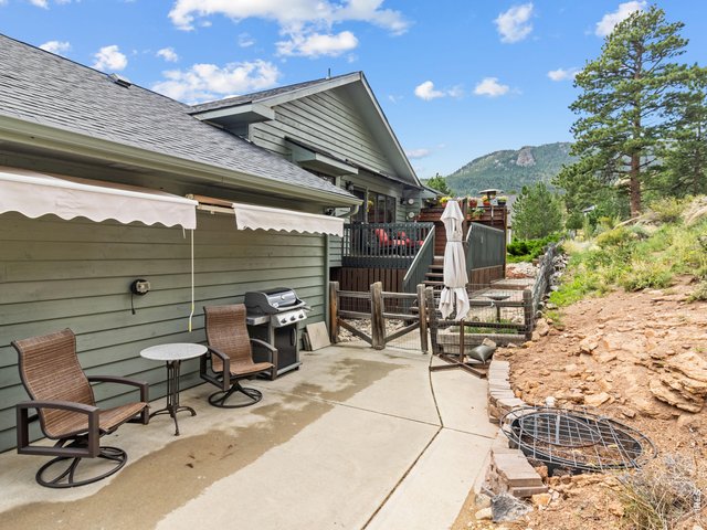 Property Photo 38 Back patio with awnings