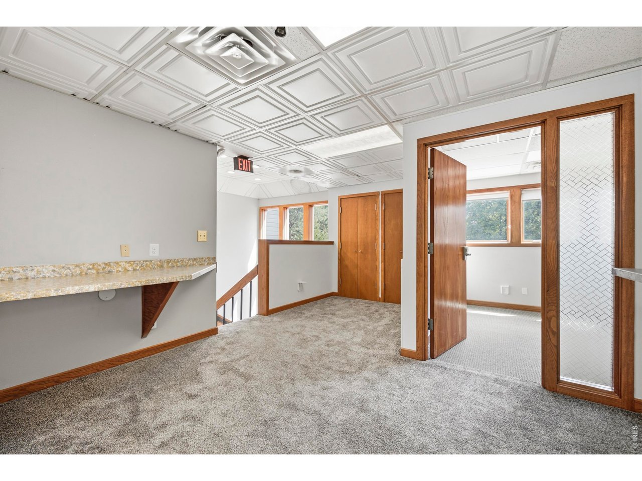 Property Photo 22 Upper level with private offices & more