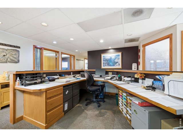 Property Photo 9 Built in reception desk with ample space & storage