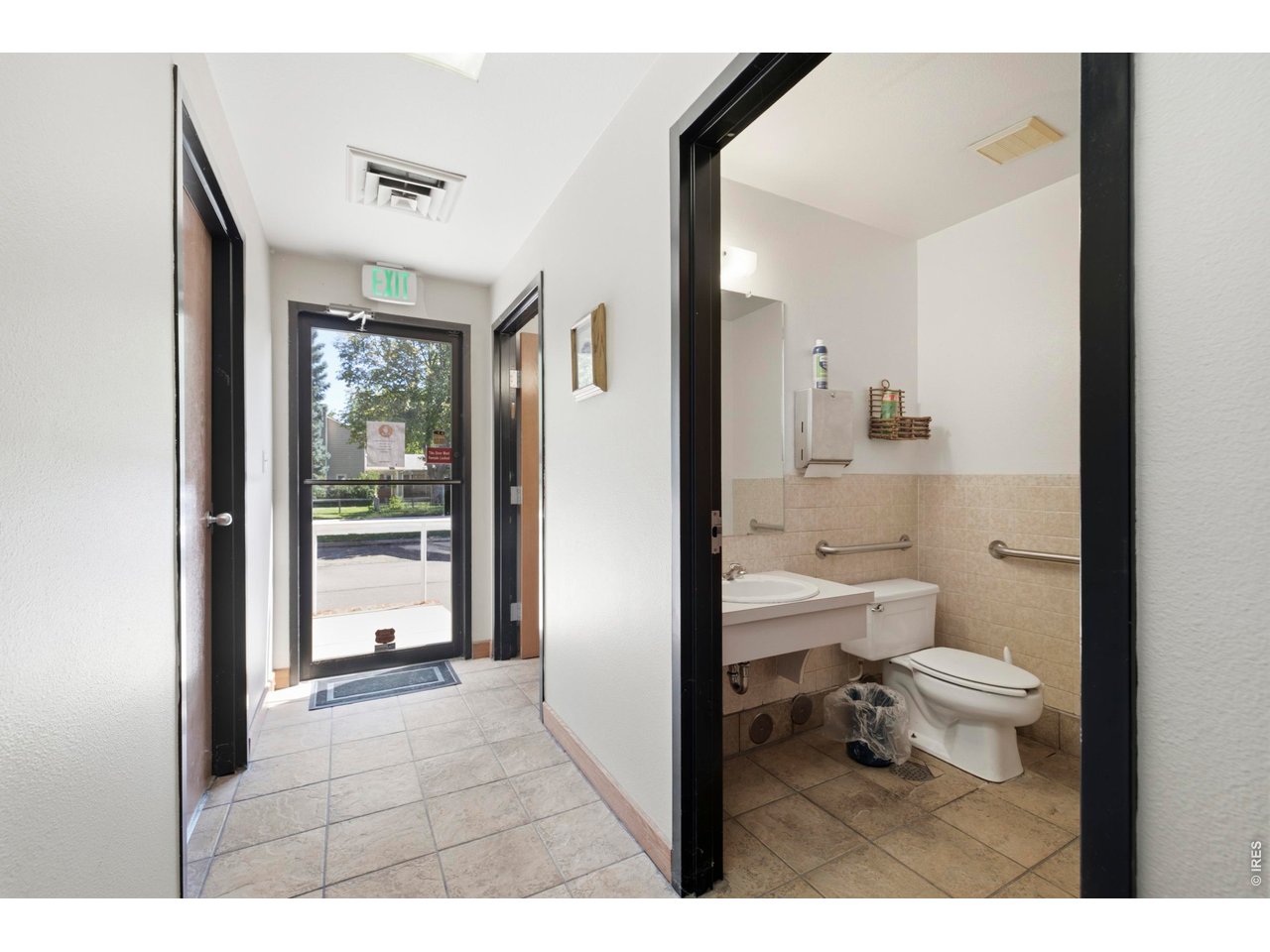 Property Photo 19 2nd entrance for main floor with private restrooms