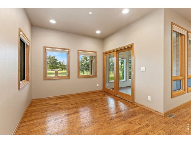 Property Photo 16 Eatin dining area with sliding door to fully enclosed patio