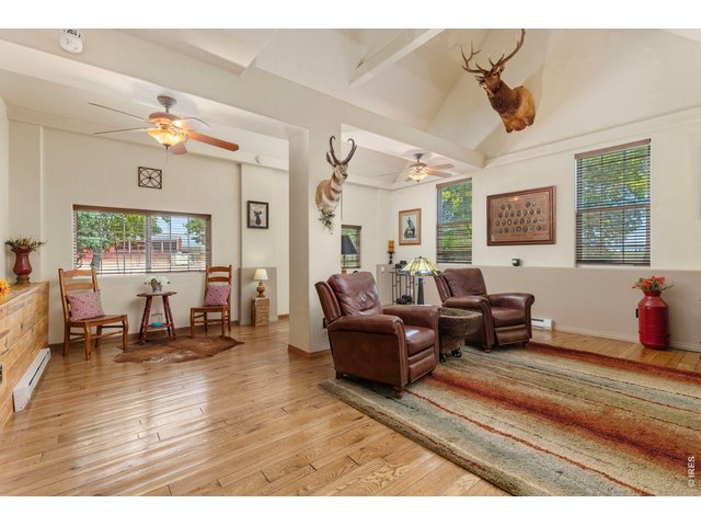 Property Photo 43 Additional main-level living space offers flexibility for relaxing, entertaining or gathering.