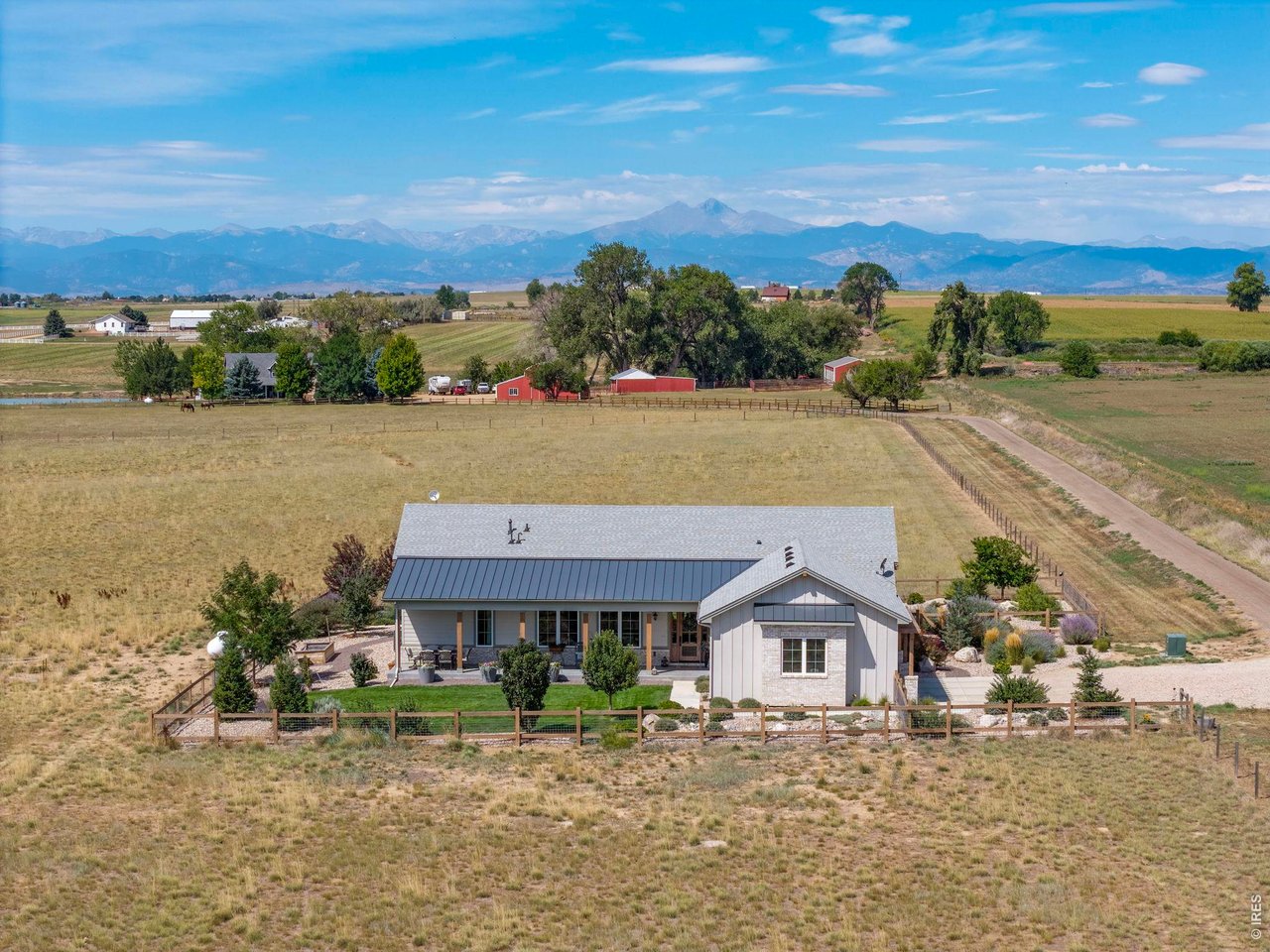 Property Photo 5 Introducing the second home: a custom 2,720 sq. ft. ranch-style residence built in 2023, surrounded by pasture with Front Range views.