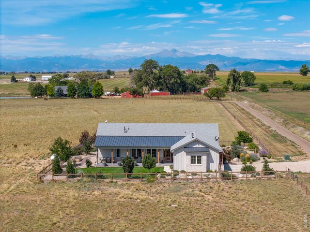 Property Photo 5 Introducing the second home: a custom 2,720 sq. ft. ranch-style residence built in 2023, surrounded by pasture with Front Range views.