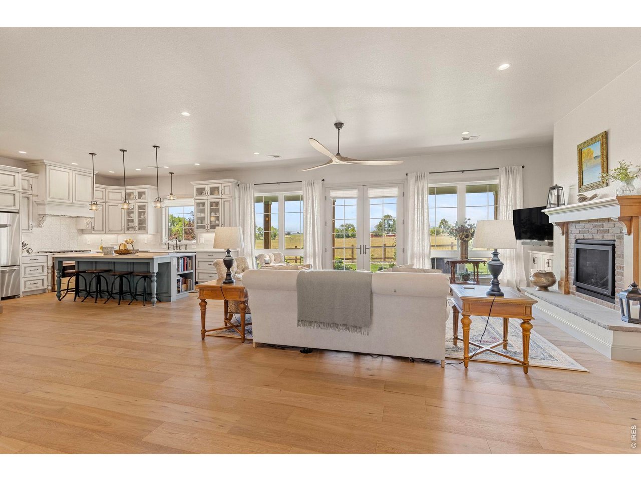 Property Photo 9 Open-concept living and kitchen areas showcase the spacious single-level design.