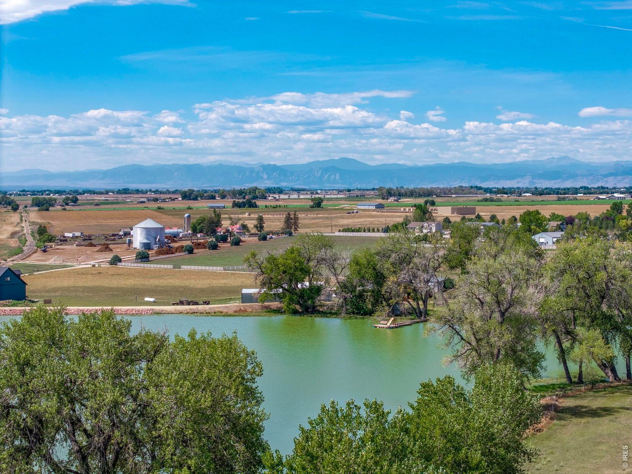 Property Photo 48 Water, mature trees and expansive western views toward the Front Range define the setting at Hidden Lakes Ranch.