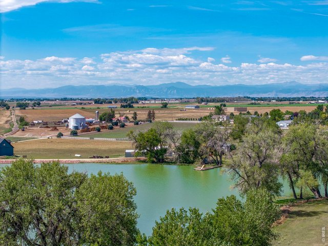 Property Photo 48 Water, mature trees and expansive western views toward the Front Range define the setting at Hidden Lakes Ranch.