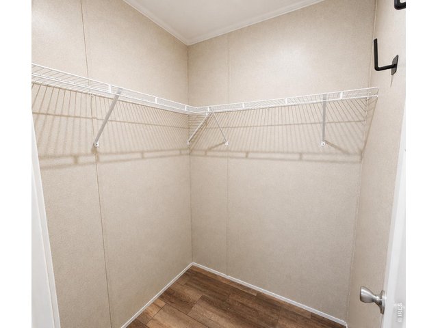 Property Photo 18 Primary Bedroom Walk-In Closet