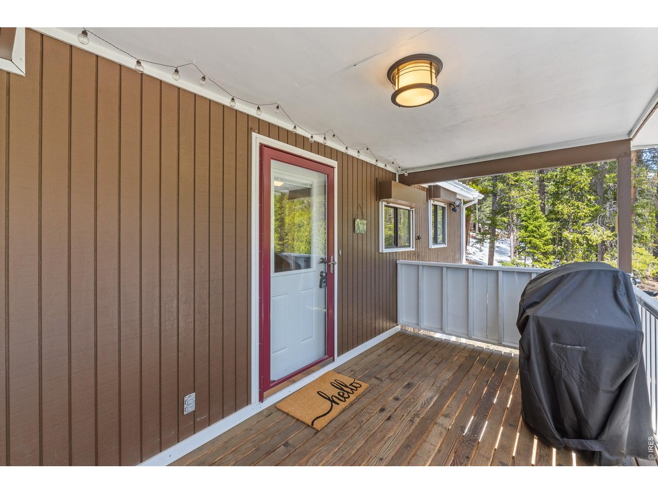 Property Photo 22 Covered Deck for Grilling just off of the Kitchen
