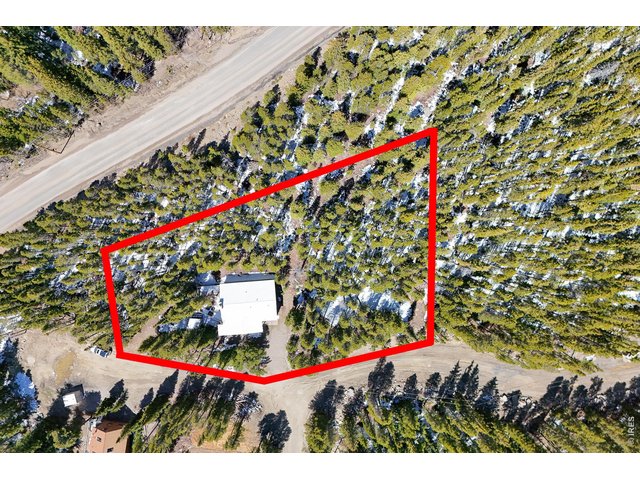 Property Photo 39 The Seller Owns multiple Lots around the Property! You could easily upgrade to Half an Acre or More!
