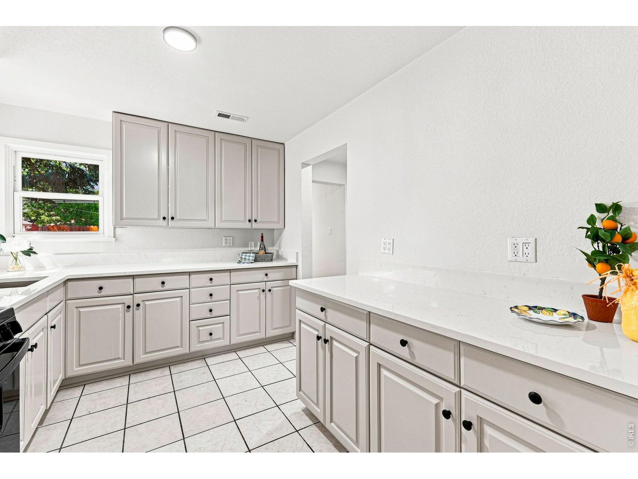 Property Photo 15 Brand-new kitchen with new cabinetry, quartz countertops, and a new gas range/oven