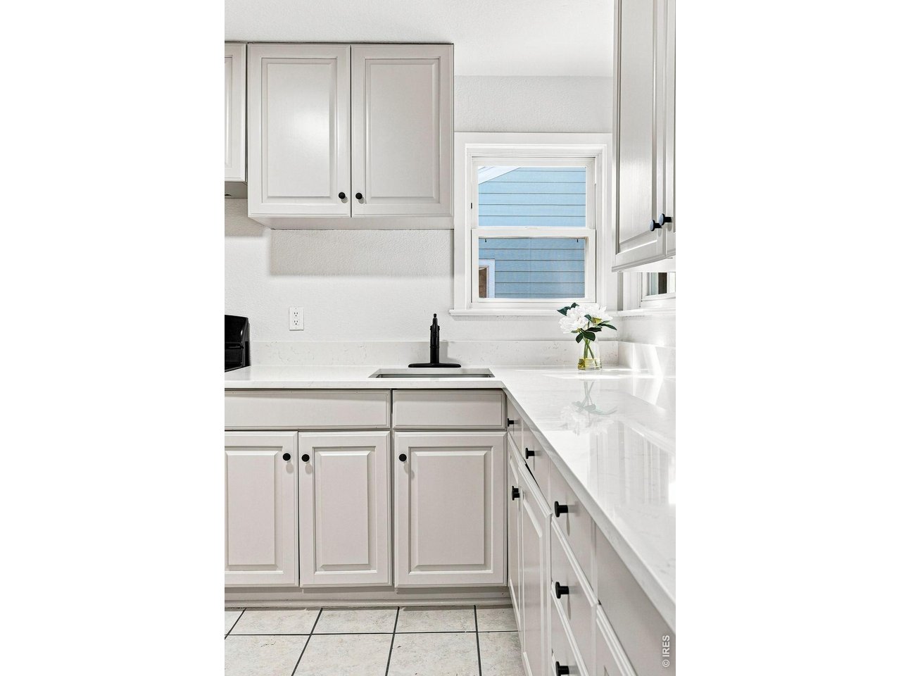 Property Photo 19 Brand-new kitchen with new cabinetry, quartz countertops, and a new gas range/oven