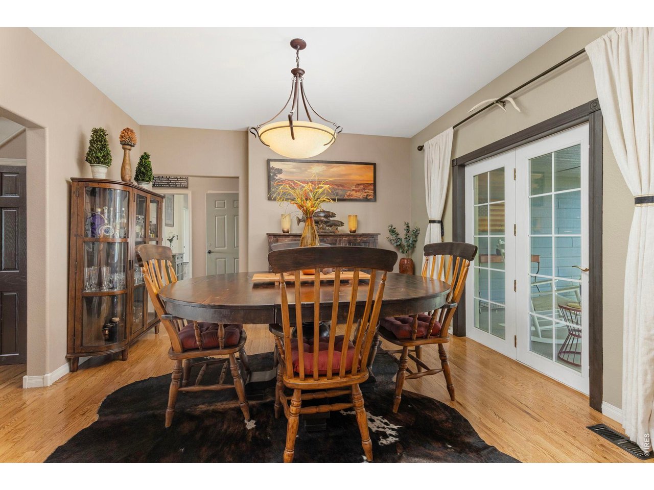 Property Photo 38 Formal dining area with direct access to the covered outdoor living space.