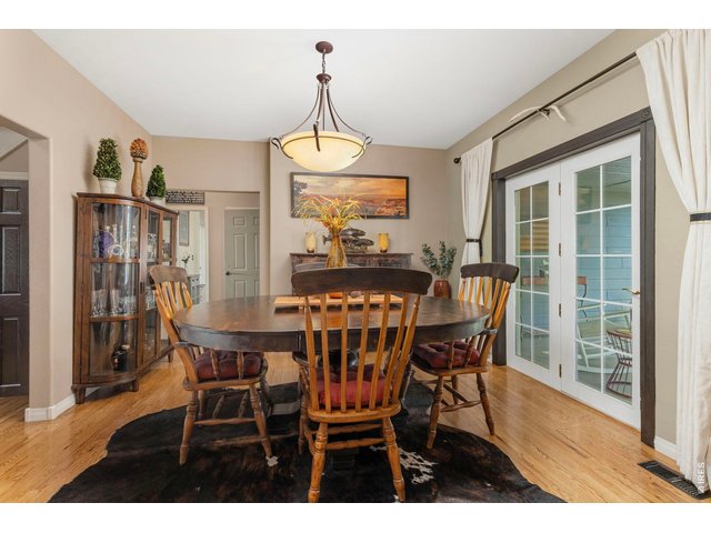 Property Photo 38 Formal dining area with direct access to the covered outdoor living space.