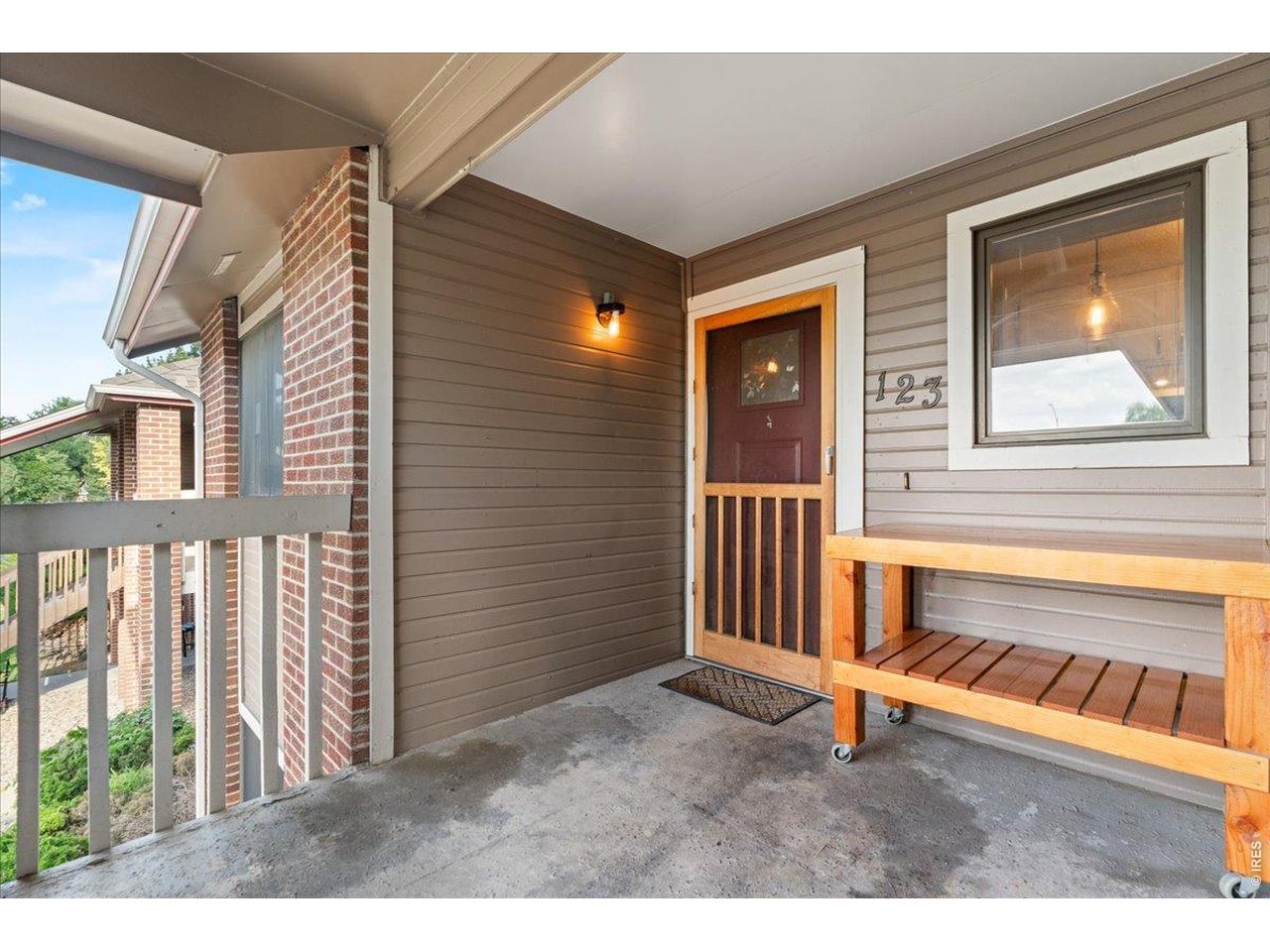 Property Photo 35 Covered front porch with private entrance and plenty of sitting space