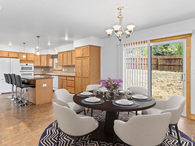 Property Photo 11 Separate dining room opens to the patio out back.