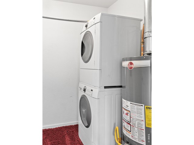 Property Photo 42 Private laundry/utility room includes stack washer/dryer.