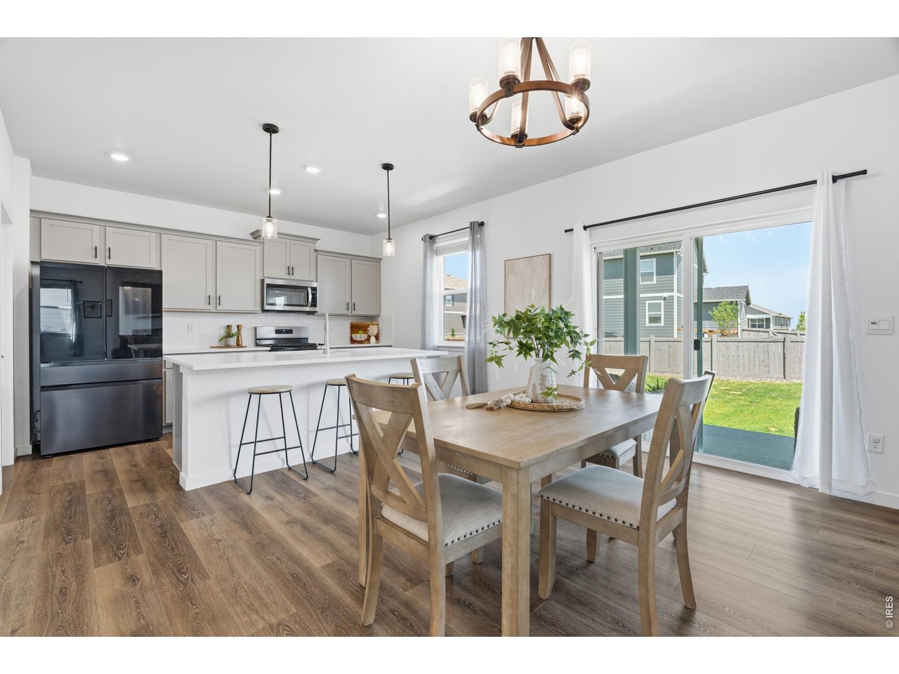 Property Photo 9 Seamless flow from living to kitchen makes this layout perfect for entertaining and everyday family life.