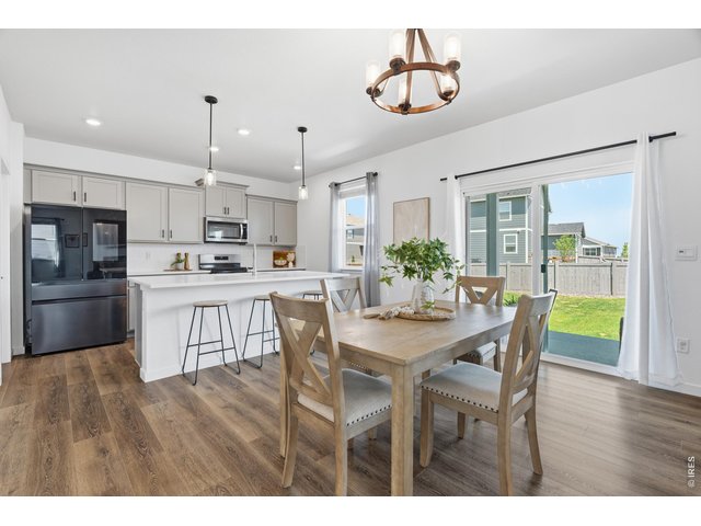 Property Photo 9 Seamless flow from living to kitchen makes this layout perfect for entertaining and everyday family life.