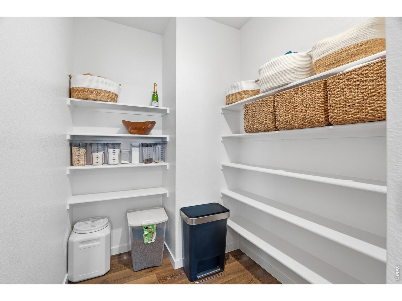 Property Photo 10 Huge walk-in pantry with extra shelving keeps everything organized and within reach.