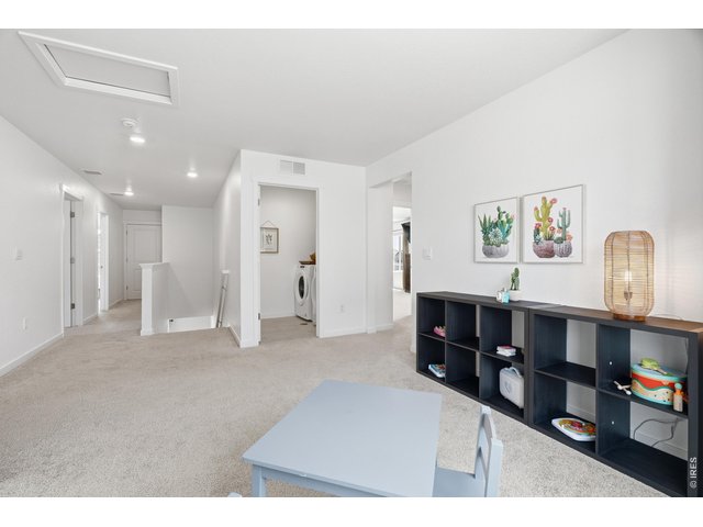 Property Photo 24 Central loft sits steps from the convenient upstairs laundry room no hauling baskets between floors.