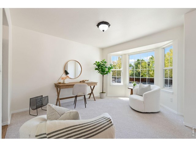 Property Photo 5 Sitting area can easily be converted to a study
