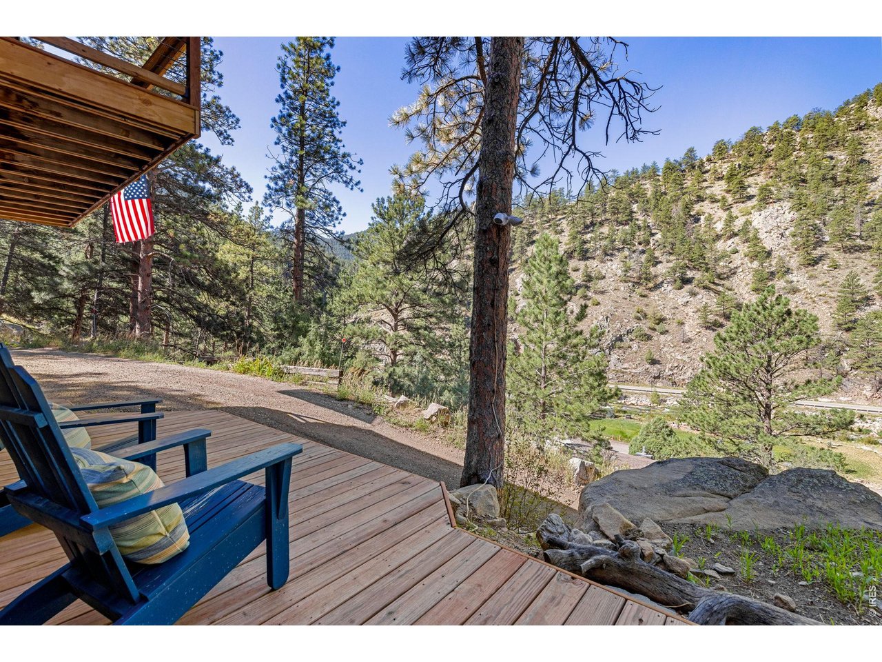 Property Photo 32 Wood deck extends the home's living spaces into the outdoors.