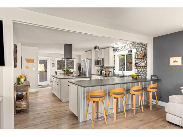 Property Photo 10 Fully remodeled kitchen designed with both everyday living and entertaining in mind.