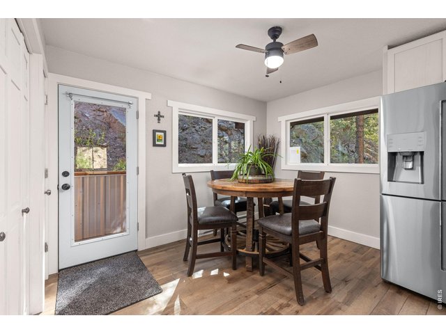 Property Photo 14 Generous eat-in kitchen provides plenty of room to gather while enjoying the surrounding canyon views.