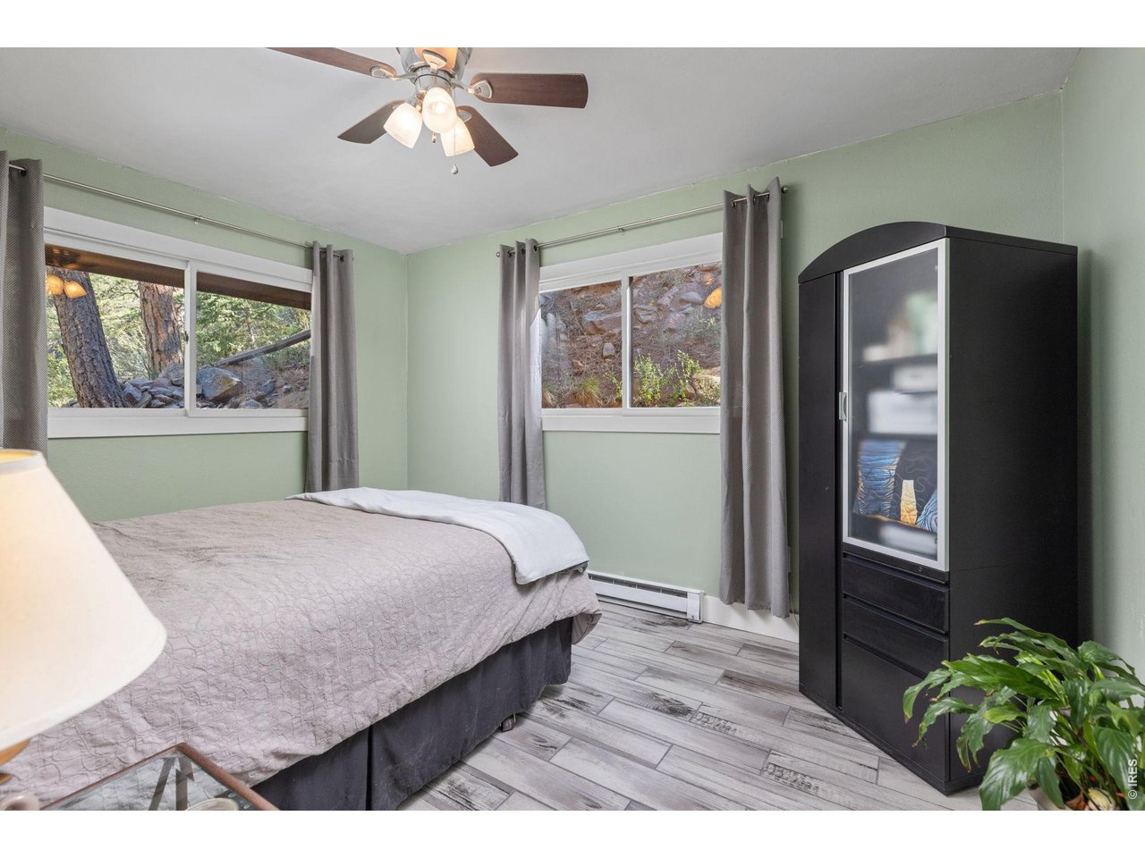Property Photo 21 Flexible main-level bedroom can easily adapt as a home office, wellness space or whatever best fits your lifestyle.