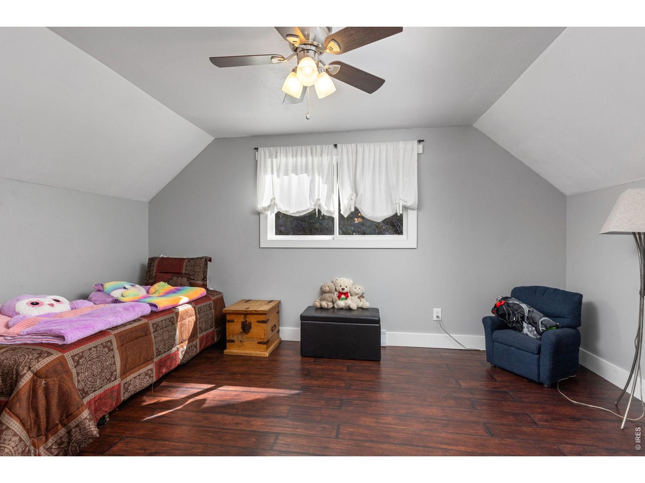 Property Photo 30 Additional upper-level bedroom offers a comfortable and inviting space.
