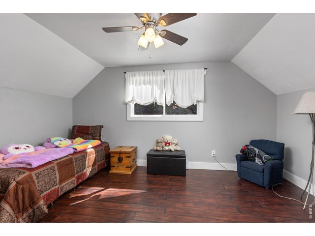 Property Photo 30 Additional upper-level bedroom offers a comfortable and inviting space.