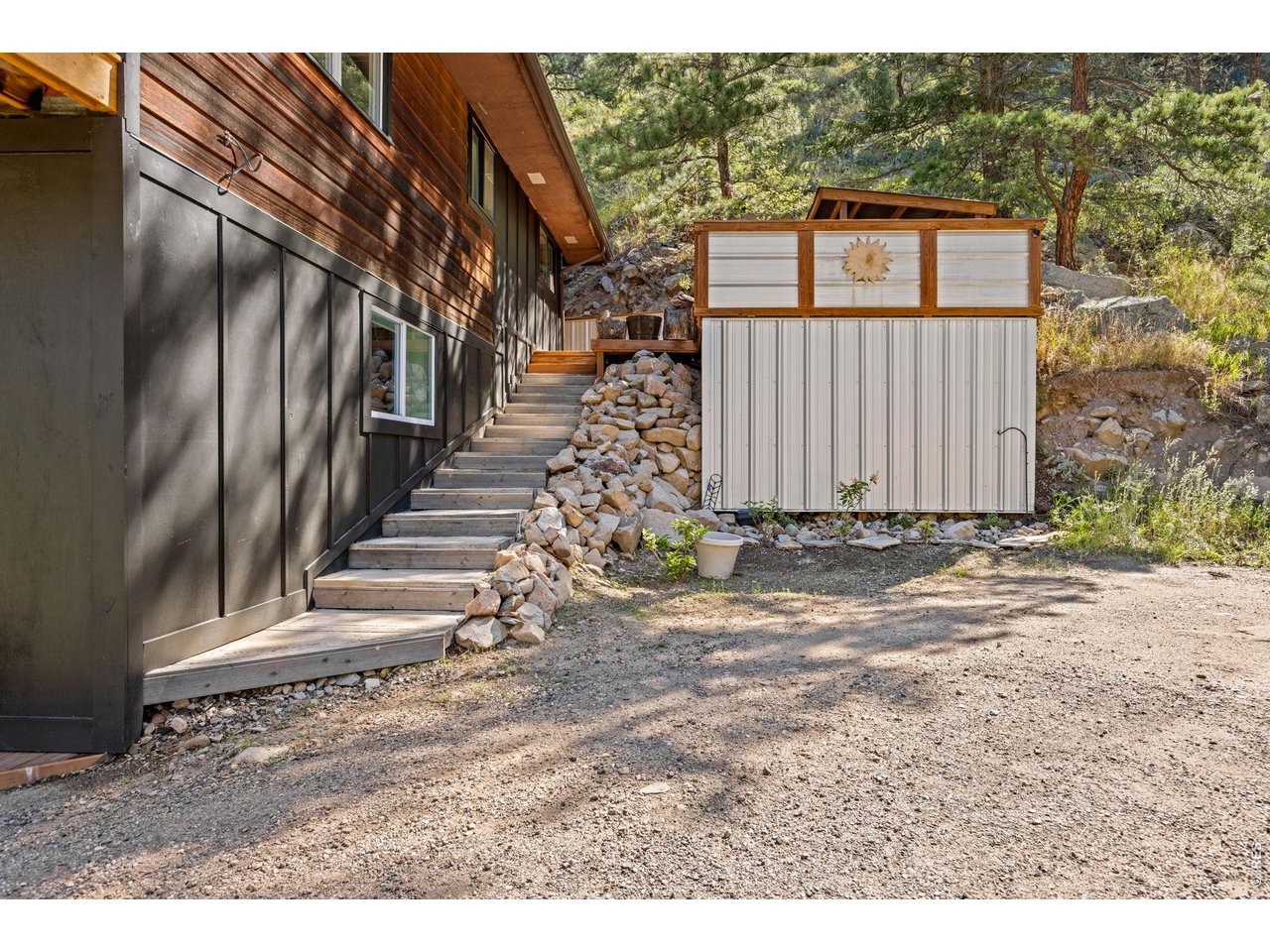 Property Photo 37 Exterior stairway connects the home's multiple outdoor living spaces.