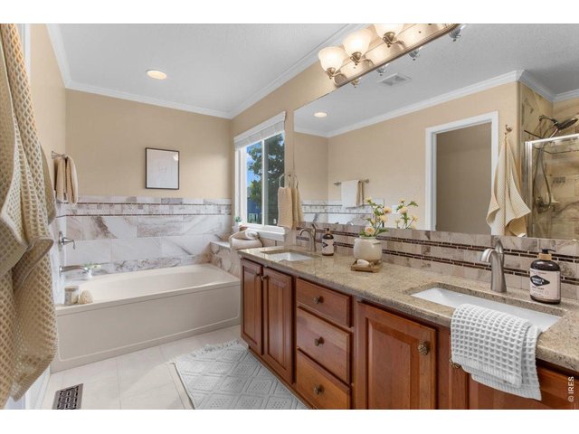 Property Photo 27 Primary bathroom with double sinks